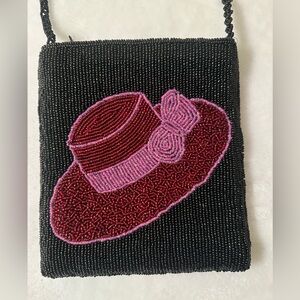 Red hat beaded black crossbody purse. EUC